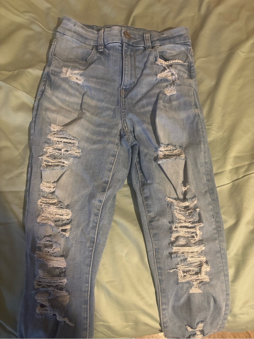 American Eagle Outfitters Next Level Stretch High Rise Ripped jeans